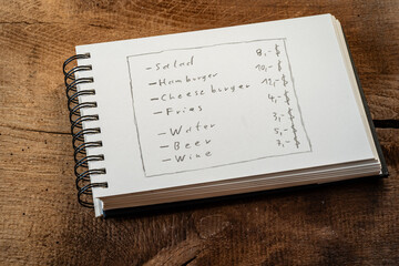 handwritten menu on sketchbook