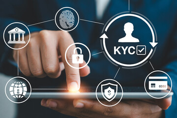 Person using a tablet for kyc verification and online banking security with icons representing fingerprint scan bank global network padlock shield and credit card for secure transactions