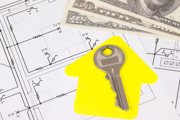 Dollar banknotes, diagrams of electric installation, key and shape of house. Planning build of home