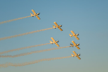 Stunt aerobatic planes performing stunts in air