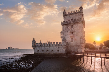 Belem Tower on the bank of the Tagus River on sunset. Lisbon, Portugal