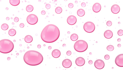 Pink, spherical droplets floating against a black background