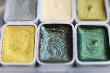 photo of metallic watercolor paint palette