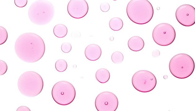Overhead shot of pink, circular liquid droplets against a stark, black background