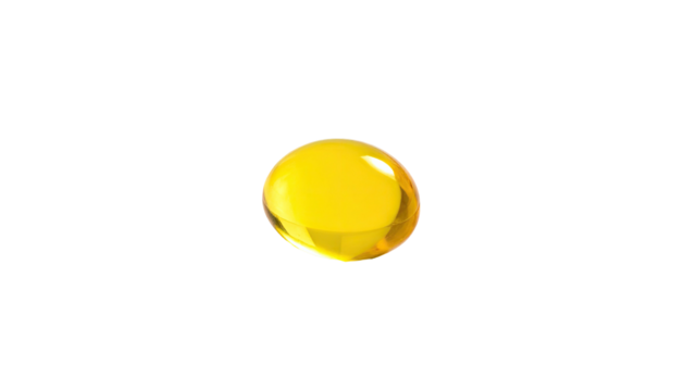 Close-up of translucent, glossy, golden-yellow liquid drop against a solid black background