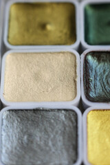 photo of metallic watercolor paint palette