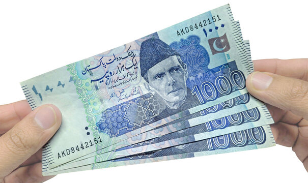 Pakistani 1000 Rupees money on hands Currency Rupees Notes