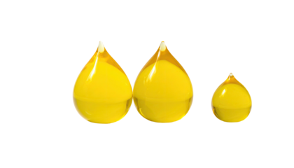Three yellow teardrop-shaped objects, with white tips, arranged against black backdrop