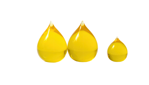 Three yellow teardrop-shaped objects, with white tips, arranged against black backdrop