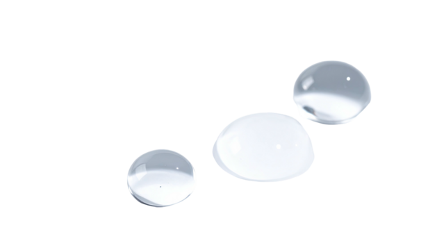 Three transparent water droplets on a contrasting black background, exhibiting refractive qualities