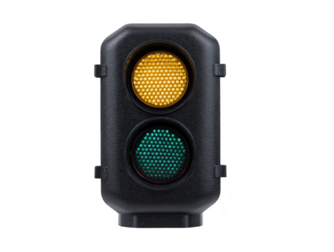 Yellow traffic light green traffic light black signal housing isolated urban safety transportation warning illuminated vertical orientation modern design city street caution stoplight road