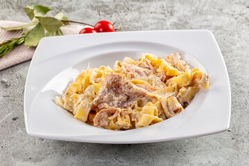 Italian pasta fettuccine with prosciutto