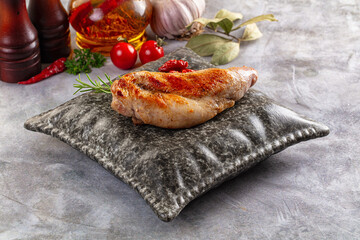 Roasted rabbit leg served rosemary