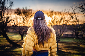 Woman at sunset enjoying Algarve countryside lifestyle