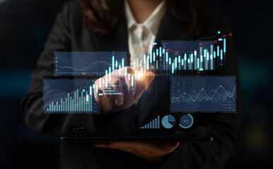 A businessman interacts with digital screens displaying graphs and charts, embodying modern...