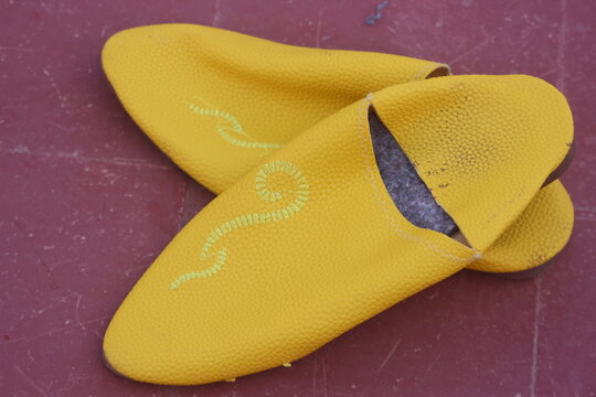 Yellow traditional Moroccan slippers known as babouche 