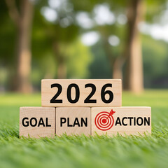 Wooden blocks display the year 2026, goal, plan, and action for future success concept