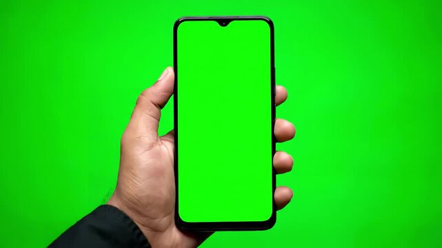 Green Screen man s hand holding a black smartphone with and touching or press display using mobile phone chroma key touch on background scene 3 distortion, overlay, glitch, static noise, scan lines