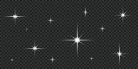 Vector set of realistic white starbursts and lens flare effects.