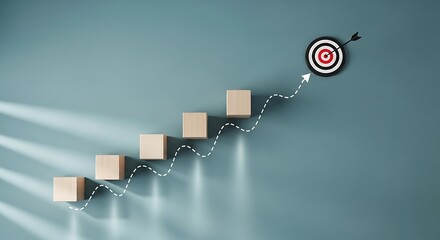Wooden blocks forming a staircase towards a target