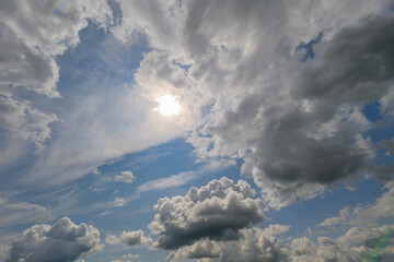 A stunning and dramatic cloudscape showcasing sunlight beautifully peeking through the clouds