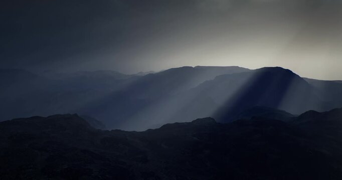 Dramatic mountain range is visible at dusk with heavy cloud cover. Rays of sunlight break through, casting a mystical glow over the landscape and enhancing the serene atmosphere.