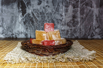 Turkish delight in a woven basket. Traditional eastern sweets