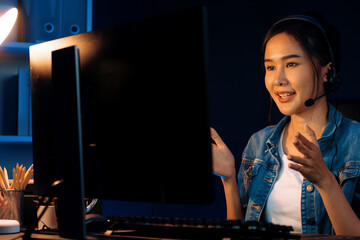 Host channel Asian influencer talking in broadcast streaming online wearing headsets on social...