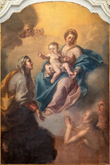 Fototapeta premium POSITANO, ITALY - OCTOBER 7, 2025: The painting of Madonna with St. Ann in the Cathedral Santa Maria Assunta by Gaetano Caporizzo 1794