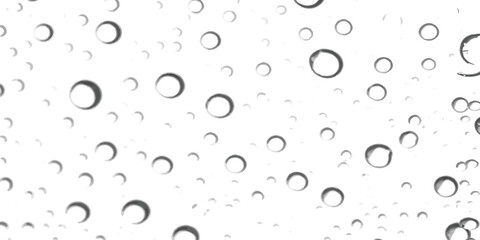 Macro view of clear water droplets and air bubbles on a transparent surface