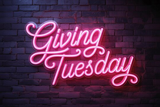 Giving Tuesday pink neon sign illuminating a dark brick wall background, symbolizing modern digital advertising, online fundraising, and urban charity promotion.
