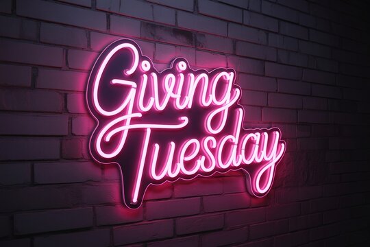 Giving Tuesday pink neon sign illuminating a dark brick wall background, symbolizing modern digital advertising, online fundraising, and urban charity promotion.