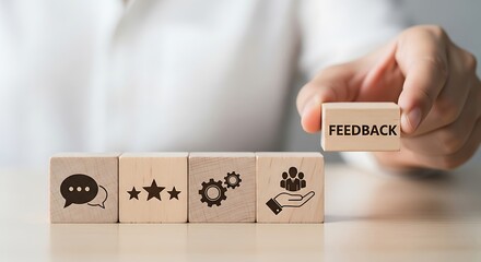 Hand holding wooden block with feedback text and icons