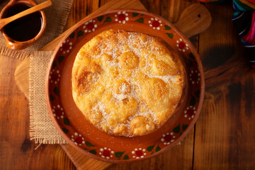 Mexican Buñuelos. Traditional food at Christmas and winter holidays in Mexico, these are fried dough flatbread sprinkled with sugar or covered in a syrup made with piloncillo, cinnamon, and guava.