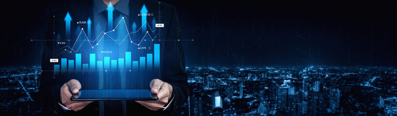 A business professional showcases advanced data visualization featuring graphs and charts on a...