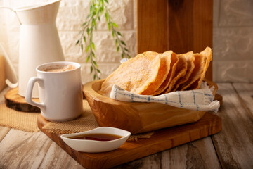 Mexican Buñuelos. Traditional food at Christmas and winter holidays in Mexico, these are fried dough flatbread sprinkled with sugar or covered in a syrup made with piloncillo, cinnamon, and guava.