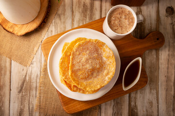 Mexican Buñuelos. Traditional food at Christmas and winter holidays in Mexico, these are fried dough flatbread sprinkled with sugar or covered in a syrup made with piloncillo, cinnamon, and guava.