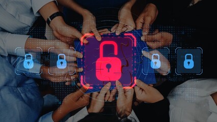 A group of diverse hands come together over a digital representation of security, highlighting collaboration in protecting data and enhancing cybersecurity measures. Raster