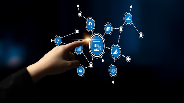 A hand reaches out toward a digital network interface, illustrating technology and connectivity concepts through various icons, showcasing modern digital interaction. Tessel