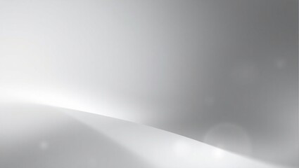 A blurry gray background with a few white circles. The background is mostly gray with some white