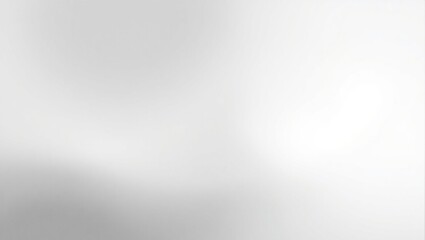 A blurry gray background with a few white circles. The background is mostly gray with some white