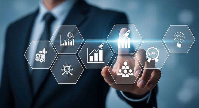 Businessman touching a digital interface with icons representing business growth, teamwork, and achieving goals - Powered by Adobe