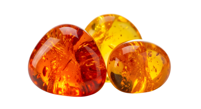 Three polished amber stones with warm orange and yellow hues
