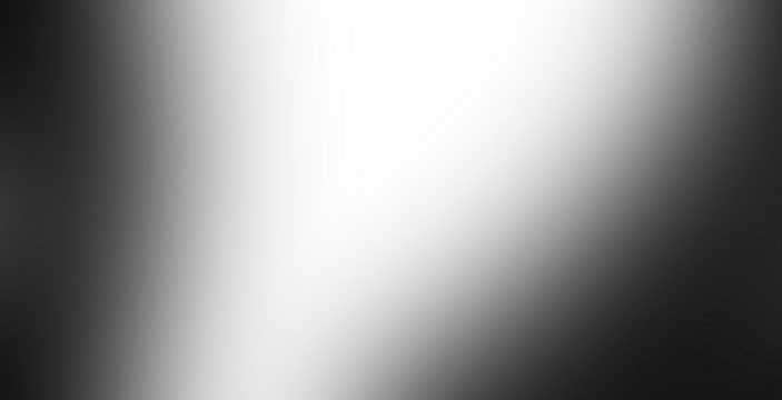 Abstract brushed metal texture with bright light reflection