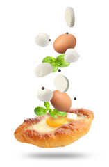 Khachapuri and ingredients in air on white background