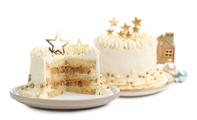 Delicious cakes with Christmas decor isolated on white