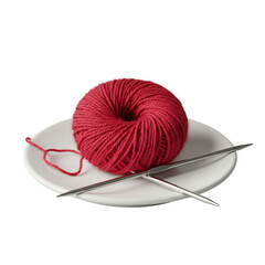 Soft, vibrant red merino wool yarn, coiled with a polished silver knitting needle on a transparent ceramic plate, against a transparent studio background with soft lighting. Luxury crafting concept