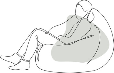 Person relaxing in beanbag chair sitting