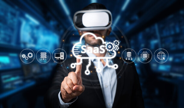 A business professional engages with SaaS solutions using virtual reality technology in a modern digital workspace, emphasizing innovation and cloud computing advantages. XDMCP