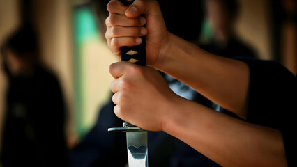 The moment of drawing the sword during kendo training